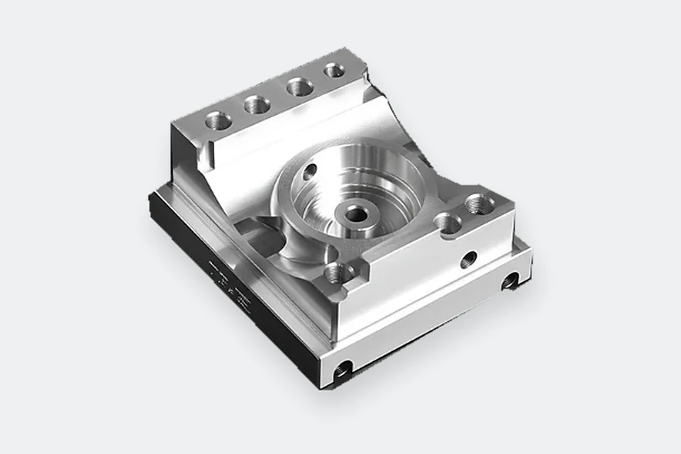 Machined housing with bores, pockets and mounting holes