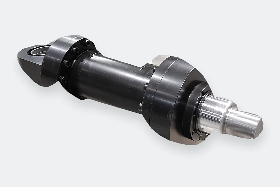 Mill-style hydraulic cylinder with a chrome piston rod and mounting eye